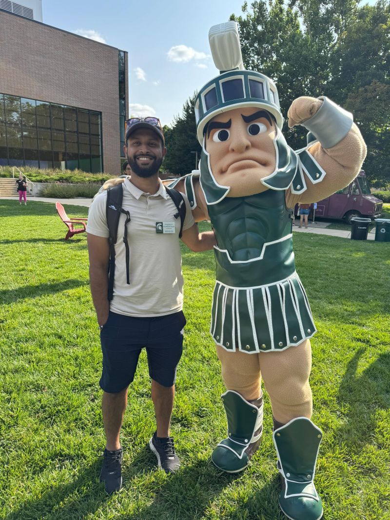 Punch Kokkalemada with Sparty at Michigan State University
